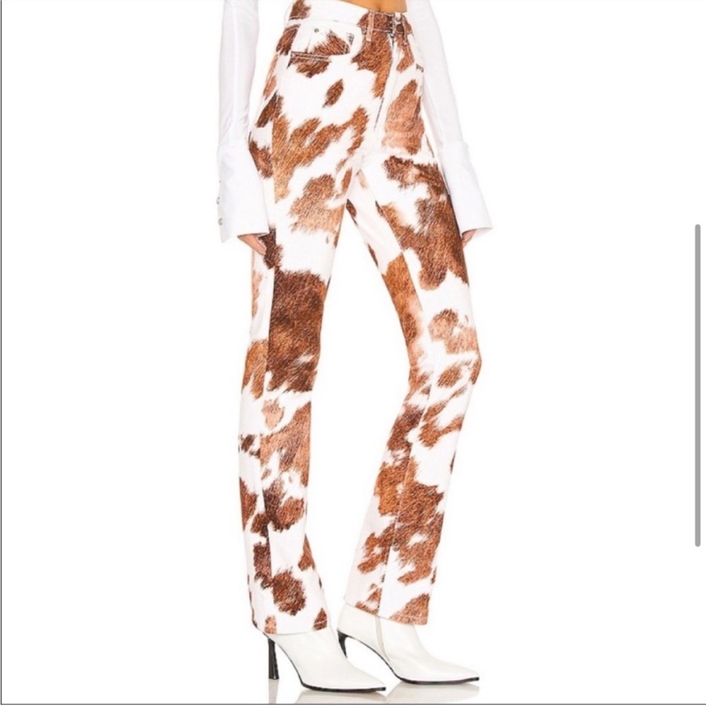 We wore what cow hide denim baby boot cut jeans